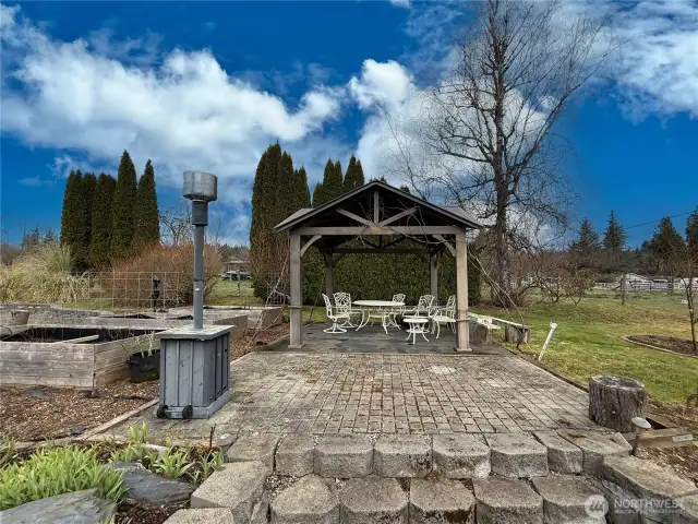 Gazebo & raised beds have watering system throughout.