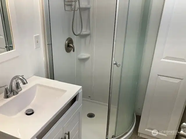 DADU 3/4 bath with corner shower.