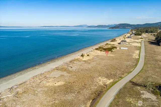 This is the shared road that winds through the entire Surfcrest community. Property is noted with Red marker.
