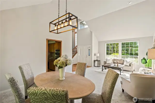 Dining opens into sunny large living room.