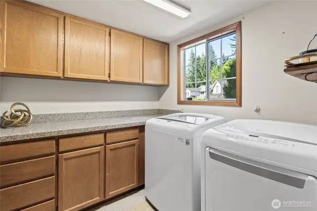 Newer washer & dryer. Lots of storage in laundry room.