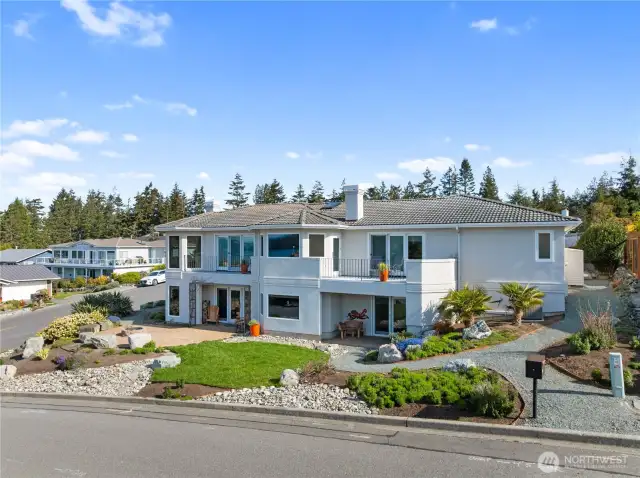 Easy care stucco siding, tiled concrete roof and flag stone patio for enjoying the fantastic Fidalgo Island weather.