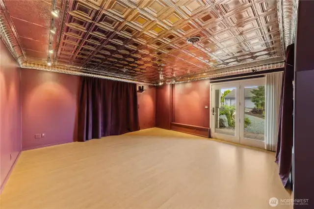 Display room, office with pizazz.  Large French doors allow a separate entrance for work from home ease