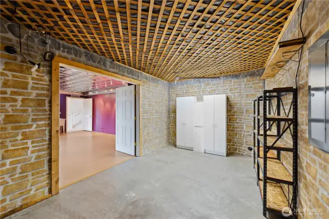 A finished basement offers additional versatility, potentially serving as a wine cellar, storage for at home office