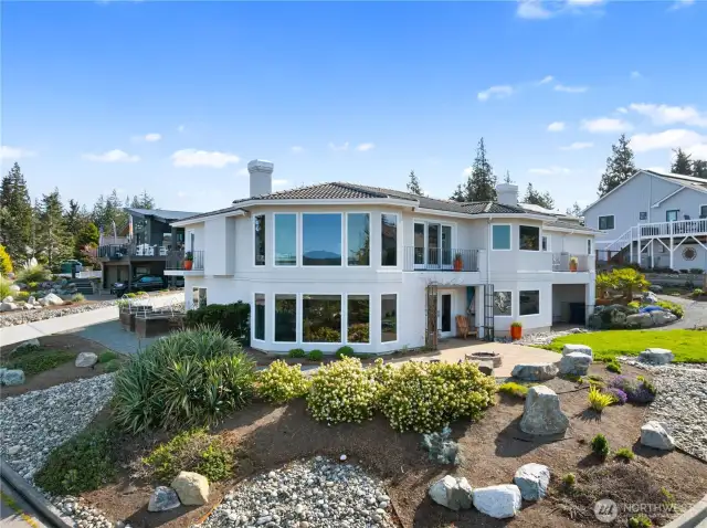 Nestled on the corner of Piper Circle and Glasgow this is a quiet neighborhood. Low maintenance landscaping with low water perennial plantings.  You'll find a patio, deck on every level to enjoy the beauty of Anacortes on Fidalgo Island.