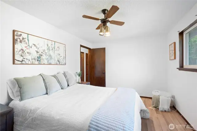 Primary bed with ceiling fan
