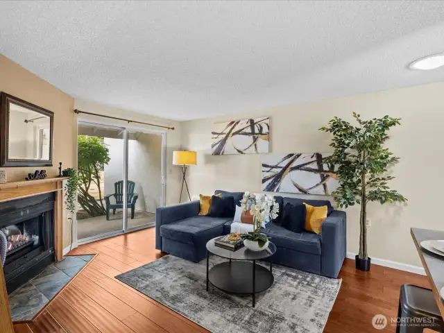 Living room with slider out to covered patio