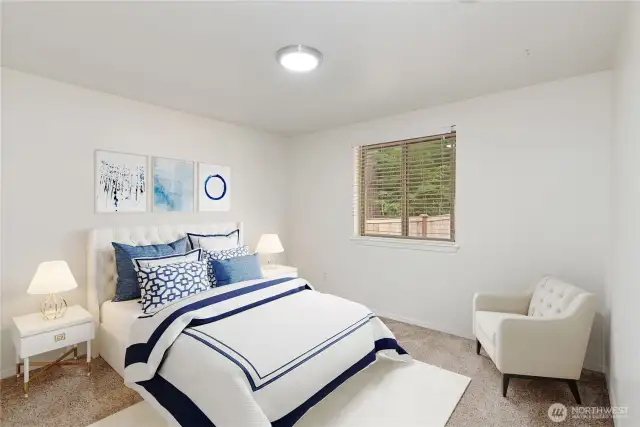Bedroom #2 virtually staged with queen size bed