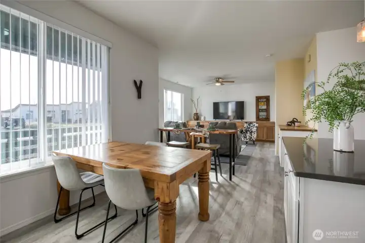 Step inside the front door into the open concept dining/kitchen/living room area.