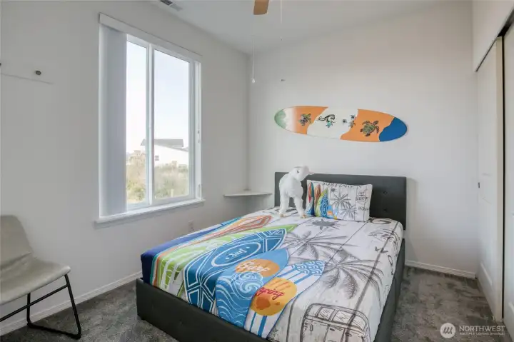 The adorable second bedroom is also off of the mud room area.
