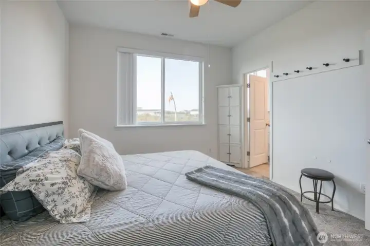 Spacious room with a ceiling fan for a little extra comfort on those summer evenings.