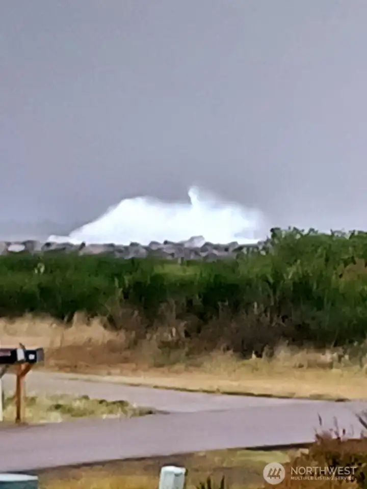 Waves crashing on the jetty, as seen from the home!