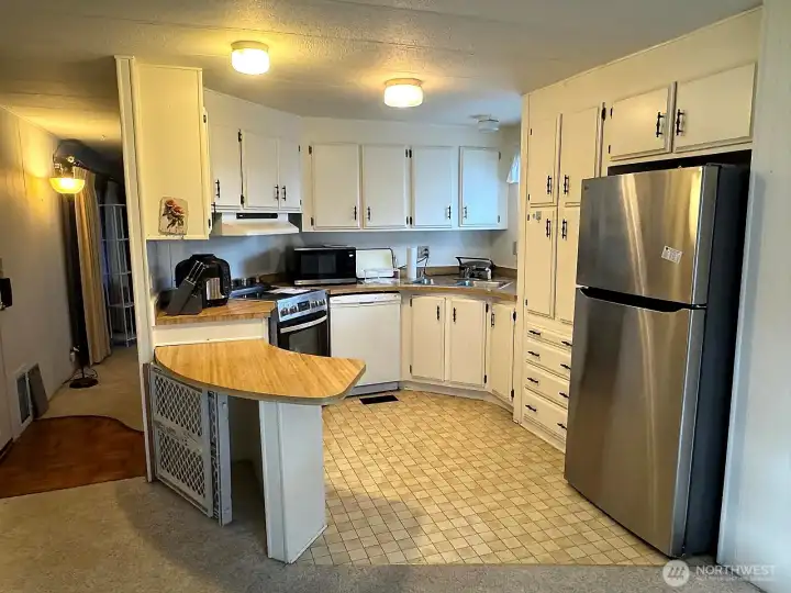 New fridge, range and dishwasher in the kitchen.