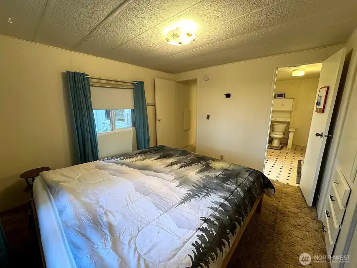 Primary bedroom attached to 3/4 bathroom.