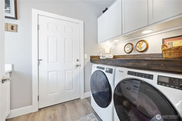 Main Entry Laundry with door access to 2-car garage