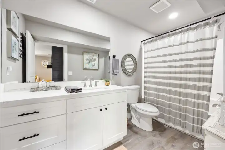 View of daylight basement guest bathroom