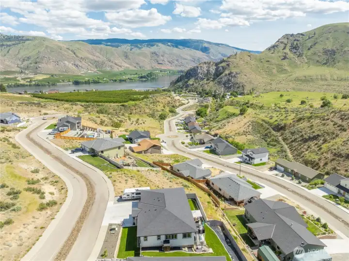 Drone view of home and natural mountain setting
