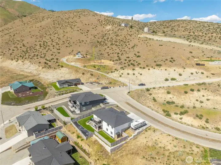 Drone view of home and natural mountain setting