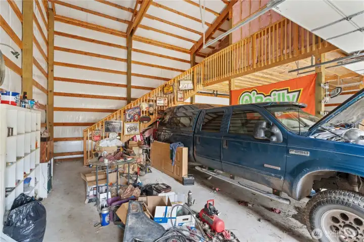 Bay 1 has room for a lift. Stairs lead to Storage Room.