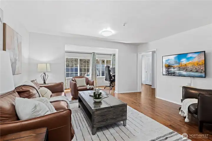 Windowed alcove features work from home desk space on each side Windowed alcove features work from home desk space on each side