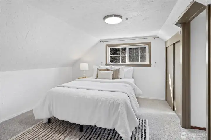 Upstairs first bedroom features a den as well