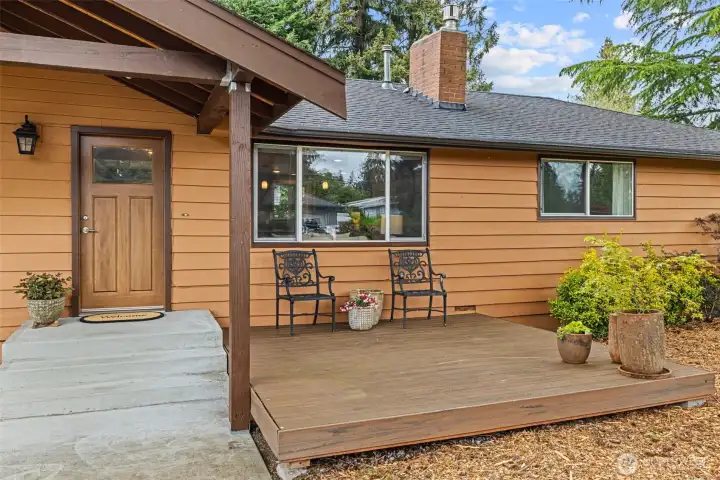 On entry, let the style begin! A covered front porch to greet your guests.