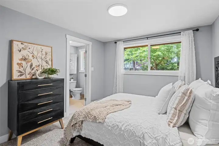 Up to date three-quarter bath en suite off primary.