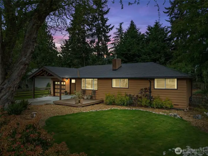 At twilight. This home offers space that lives efficiently.