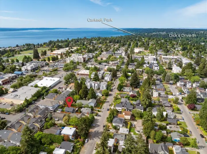 A few blocks to one of Dick's Drive-In locations and just a little further north is one of the city's best parks, Carkeek Park with views of the Olympic mountains.