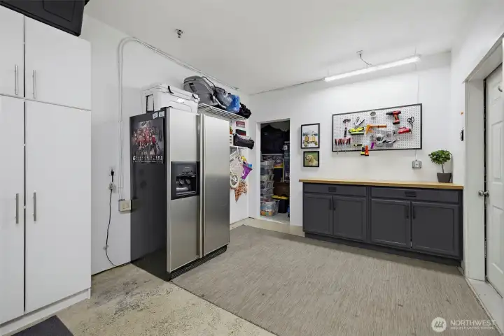 Built in work bench, built in cabinets & and additional room for storage in this oversized 1 car garage. Built in work bench, built in cabinets & and additional room for storage in this oversized 1 car garage.