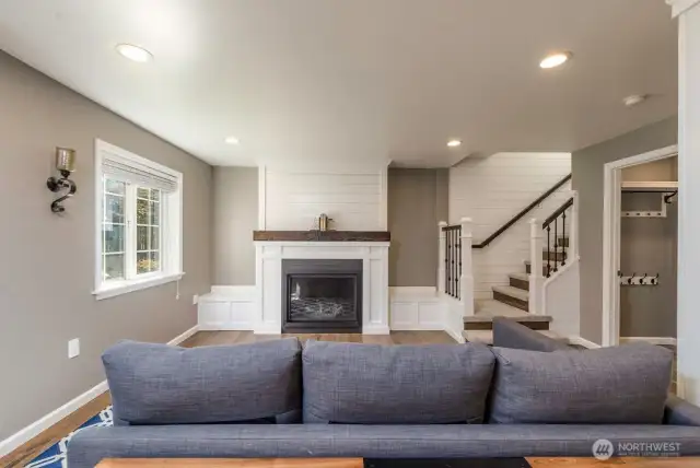Sitting room off dining room and kitchen w/ propane fireplace