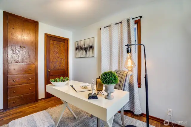 This bedroom also offers built-ins beside the closet for additional storage.
