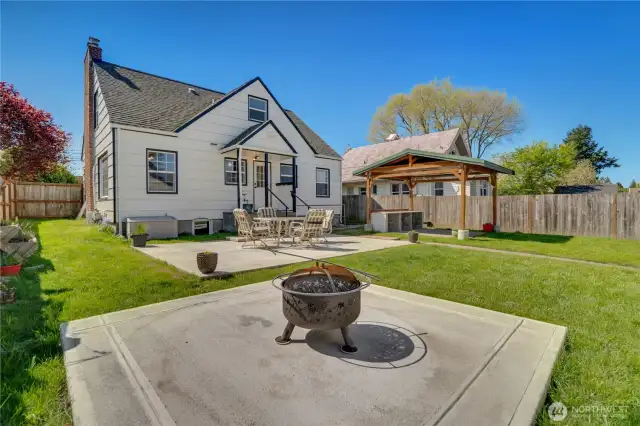 Head out to the fully fenced yard with its sunny patio and hot tub pad both poured in 2023. Get some shade on the paver patio under the gazebo cover.