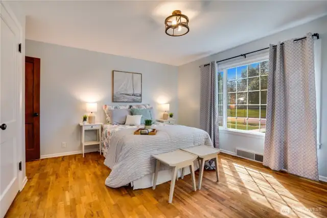 This corner bedroom is right across the hall from the updated main floor full bath, and there's a 2nd updated full bath upstairs.