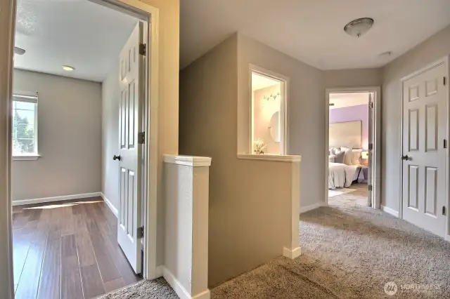 Upstairs you will find 3 comfy guest rooms plus the primary suite with ensuite bath and walk-in closet.