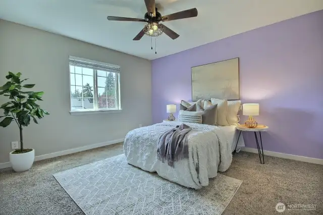 Peaceful primary suite with ensuite bath, walk-in closet, and extra closet for added storage.