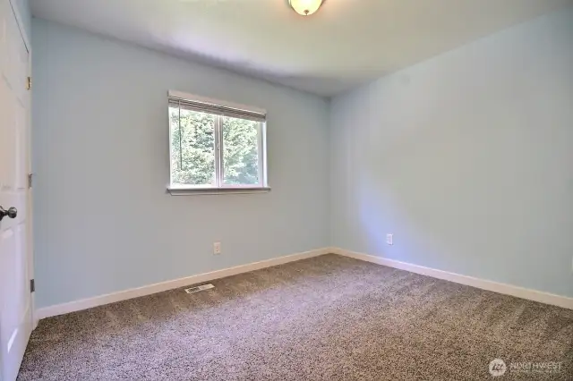 Guest bedroom #2 on the upper level also over looks the backyard.