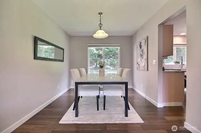 Convenient formal dining room ready for gatherings and special dinners.