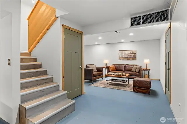 Downstairs: man cave, she cave, game room, additional living room