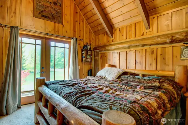 Primary bedroom with balcony