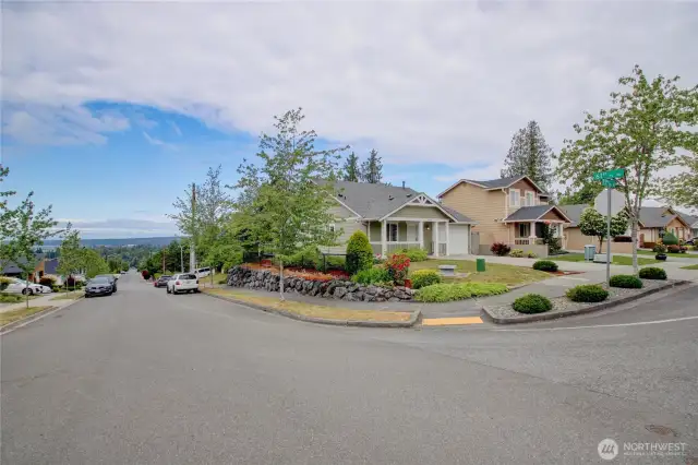 Welcome to 6120 73rd Ave NE, fully landscaped corner lot with extraordinary territorial view.