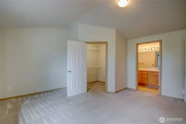 Primary bedroom walk-in closet