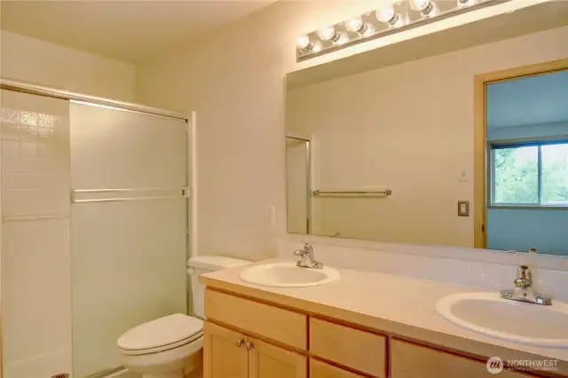 Primary Bathroom with double sinks walk in shower