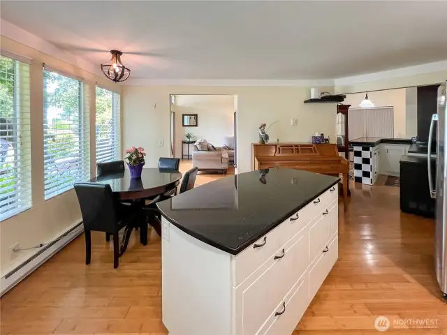 Updated kitchen with newer cabinets, granite counters and appliances. Also, a nice eat in kitchen with area.
