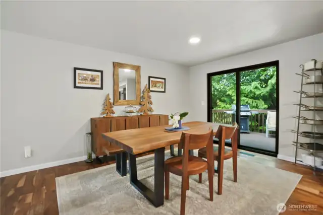 Dining space opens to the Trex deck to the backyard