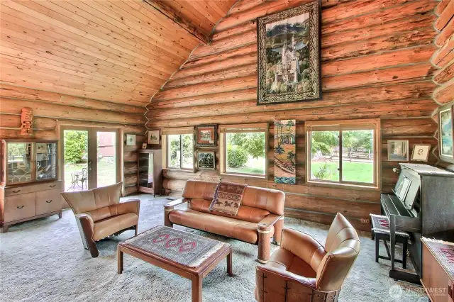 Large living area with lots of picture windows and French doors out to the deck. Beautiful territorial views as well.