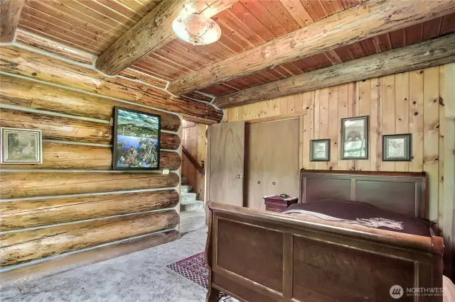 1 of 2 main floor bedrooms. Large closet space behind the door.