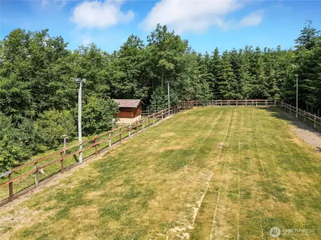 20'x60' lighted outdoor turf arena. There’s direct access to miles of logging roads for trail rides right off the property!