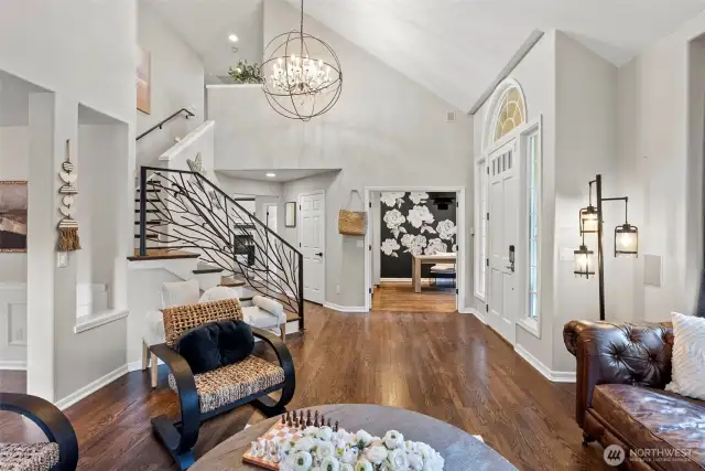 Beautiful entry with custom iron railing and new hardwood floors