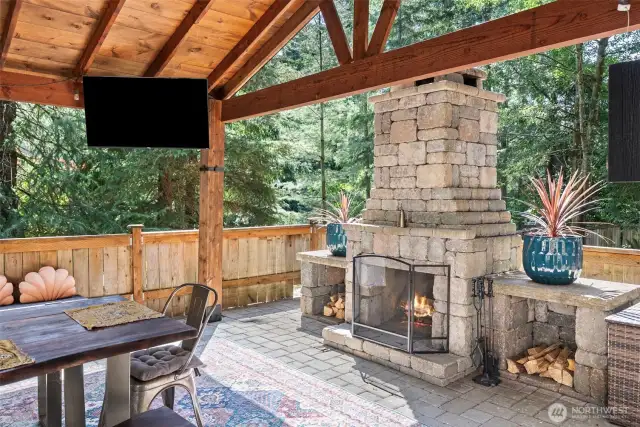 Outdoor stone fireplace for year-round use